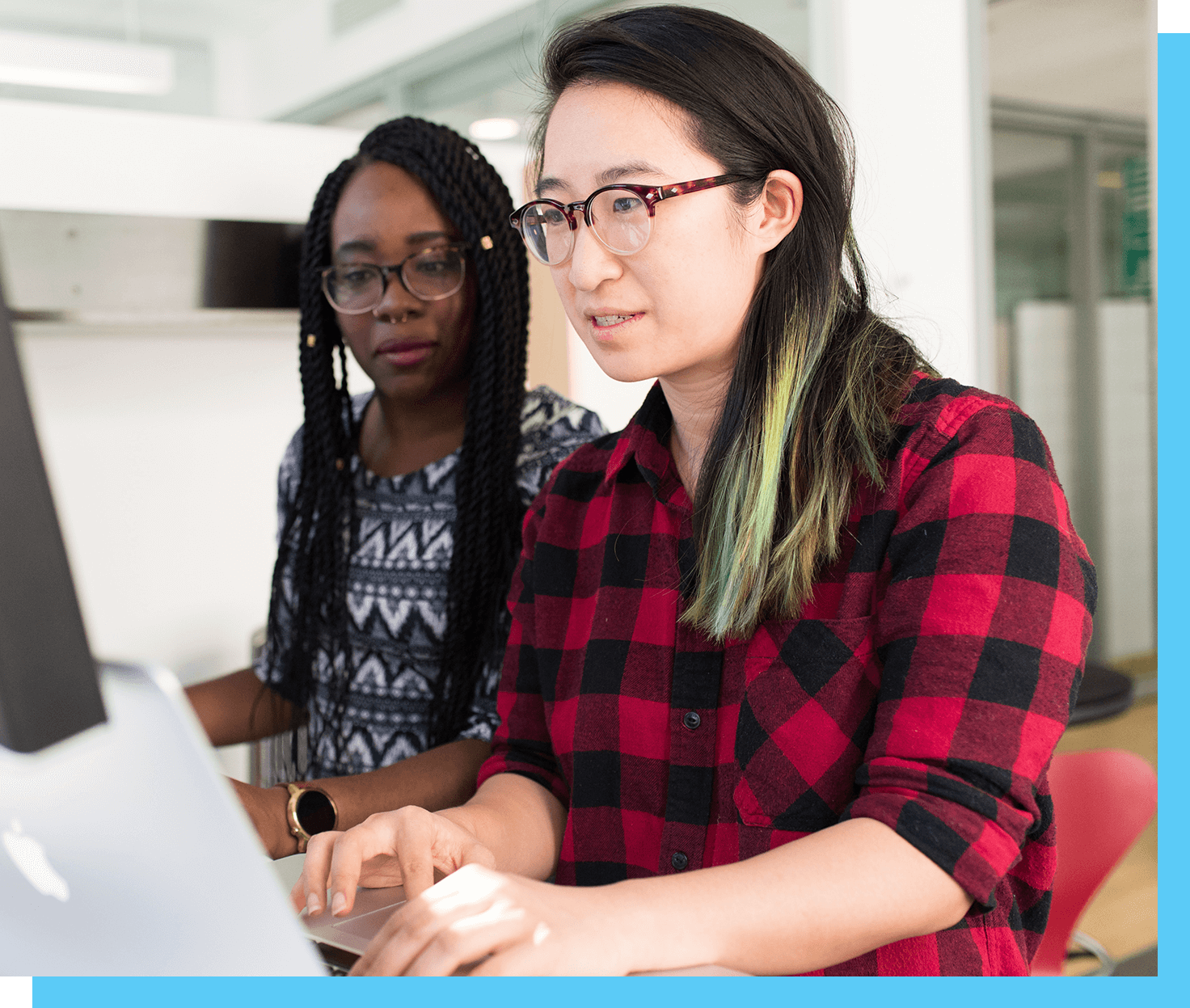 two women on a computer