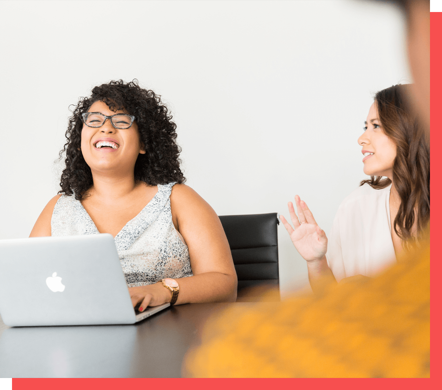 women laughing at work